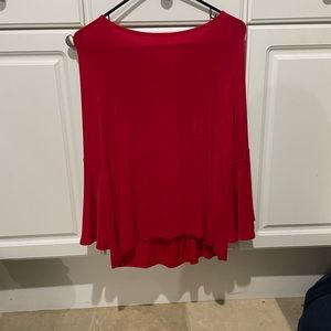 Women size 1 petite tunic, long sleeve red. Cuffs have ruffle on them. Traveler